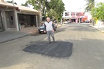Grande número de buracos no asfalto tornava via intransitável
