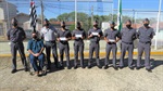 André e o tenente-coronel Gaspar e PMs da Escola de Soldados