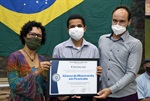 Silvia Morales, Vinicius Rodrigo dos Santos, da Aliança de Misericórdia, e Pablo Carajol