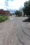 Rua Osório Duque Estrada não possui asfalto 