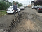 Asfalto rua Poços de Caldas 