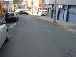 Recuperação do pavimento asfáltico da rua Prudente de Moraes, próximo ao cruzamento com a rua Benjamin Constant