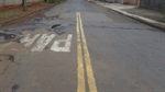 Refazer sinalização horizontal de trânsito na rua Caetano Carmignani
