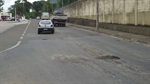 Buraco na rua Octaviano Assis, próximo a saída da Rod. SP-304