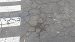 Local que necessita de reparação asfáltica
